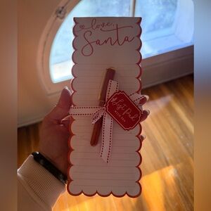 Red and White Notepad with Pen